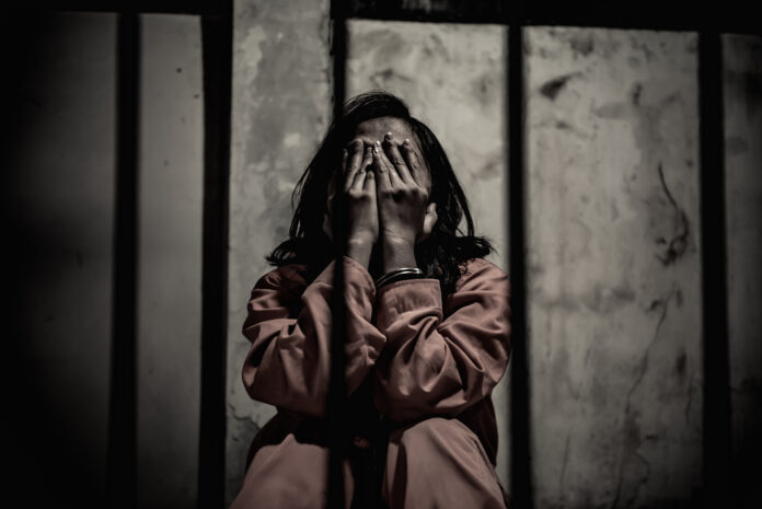 Portrait,Of,Women,Desperate,To,Catch,The,Iron,Prison,prisoner,Concept,thailand